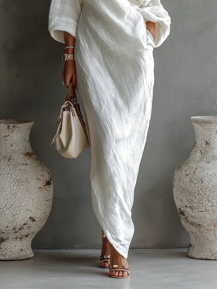 Vestido largo elegante y fluido con un solo hombro