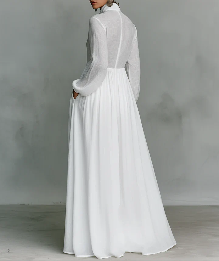 Maxi minimalista con patchwork, cuello alto y mangas largas