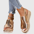 Evania -  Elegantes zapatos abiertos con acabado dorado