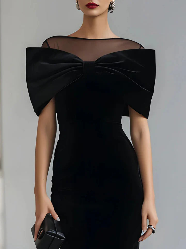 Vestido midi de terciopelo negro dramático con lazo