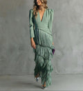Sabela - Vestido midi elegante con mangas de flecos