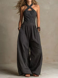 Nuria - Elegante mono con escote cruzado