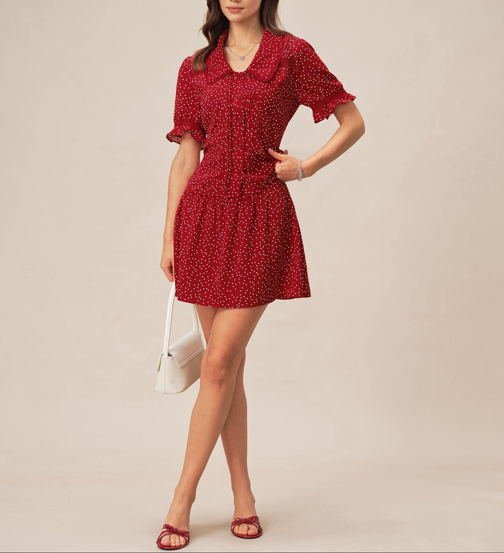 Alba - Vestido rojo con mangas abullonadas y cuello de lunares